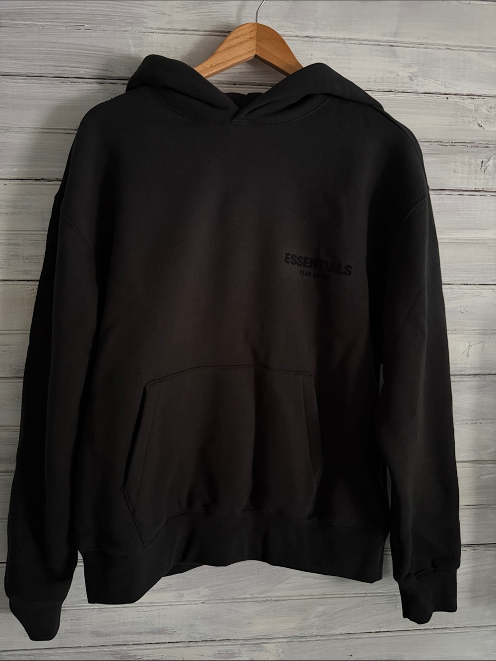 Essentials Black Men's Hoodie with Subtle Chest Logo